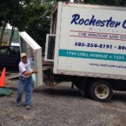 Unloading Window from Rochester Colonial Truck